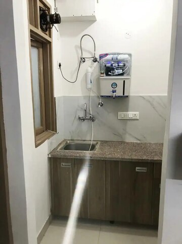 Kitchen in  Pg at Saraswati Vihar – for Rent