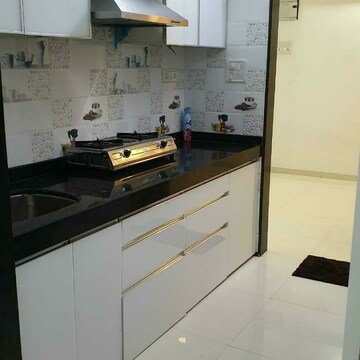 Kitchen in 4 BHK Apartment at Vesu – for Sale