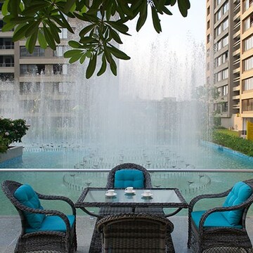 Living Room in 4 BHK Apartment at Vesu – for Sale