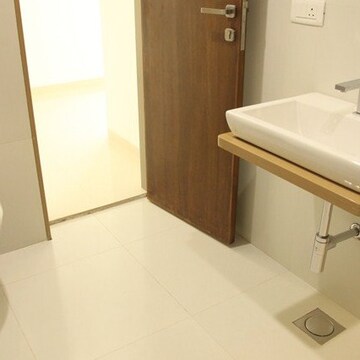 Bathroom in 4 BHK Apartment at Vesu – for Sale