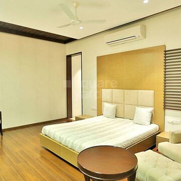 Bedroom in 4 BHK Apartment at Vesu – for Sale
