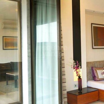 Living Room in 4 BHK Apartment at Vesu – for Sale