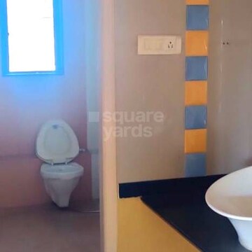 Bathroom in 4 BHK Builder Floor at Vesu – for Sale