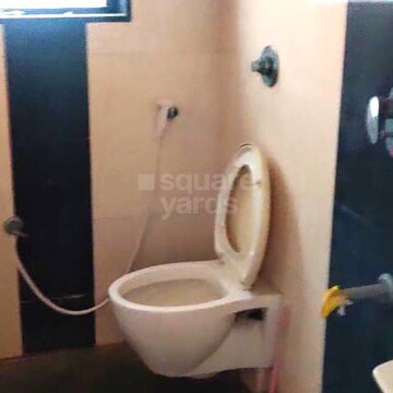 Bathroom in 4 BHK Builder Floor at Vesu – for Sale