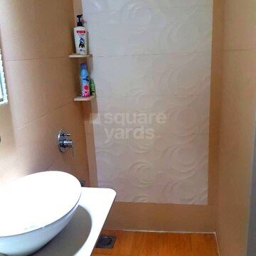 Bathroom in 2 BHK Apartment at Oshiwara Gulmohar Apartment, Andheri West – for Sale