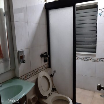 Bathroom in 1 BHK Apartment at Rustomjee Elanza, Malad West – for Sale