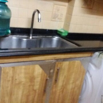 Kitchen in 2 BHK Apartment at Royal Classic Co Op Society, Andheri West – for Rent