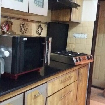 Kitchen in 2 BHK Apartment at Royal Classic Co Op Society, Andheri West – for Rent