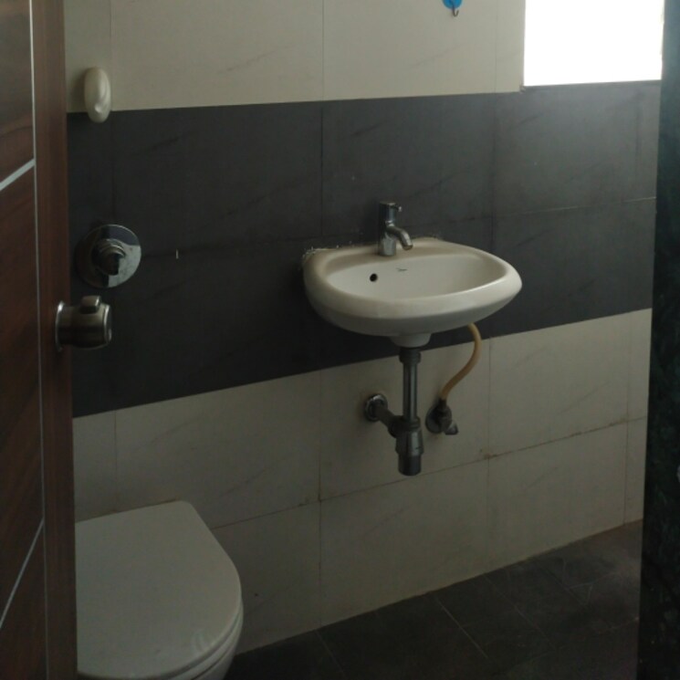 Bathroom, pride-aashiyana 2 Bedroom 780 Sq.Ft. Apartment In Bramha Skycity Pune 2673336