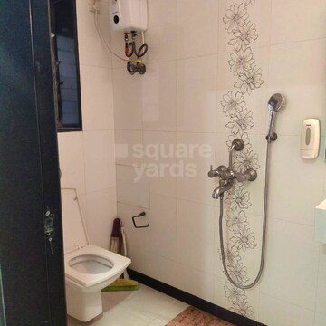 Bathroom in 2 BHK Apartment at Magnum Tower CHS, Andheri West – for Rent