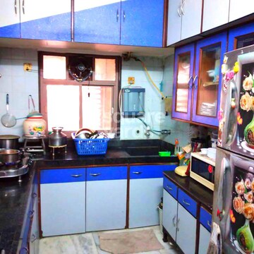 Kitchen in 2 BHK Apartment at Kanchan Ganga Apartment, Andheri West – for Sale