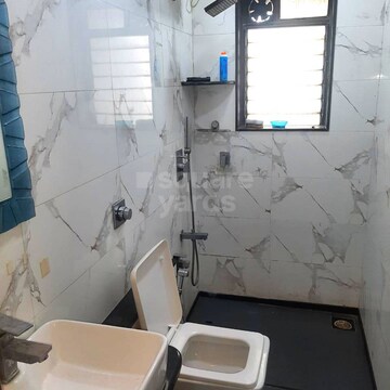 Bathroom in 2 BHK Apartment at Evershine Greens, Andheri West – for Rent