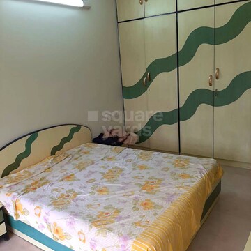 Bedroom in 2 BHK Apartment at Evershine Greens, Andheri West – for Rent