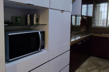 Kitchen in 4 BHK Apartment at Ajmera Beverly Hills and Royal Empire, Andheri West – for Rent