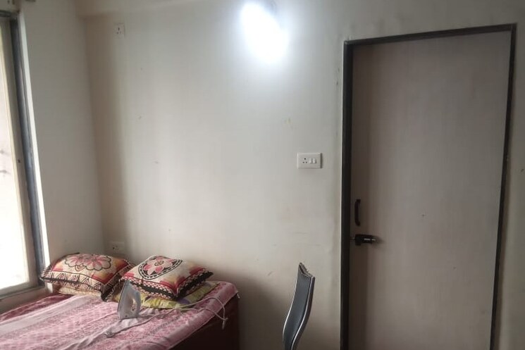 Bedroom, nirman-viva-phase-ii 1 Bedroom 650 Sq.Ft. Apartment In Ambegaon Budruk Pune 3134026