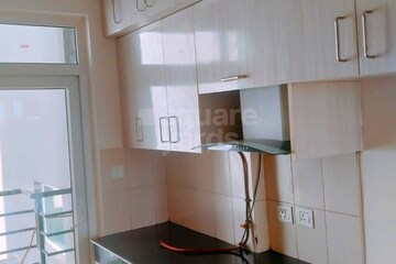Kitchen in 4 BHK Apartment at Dhoot Time Residency, Sector 63 – for Rent