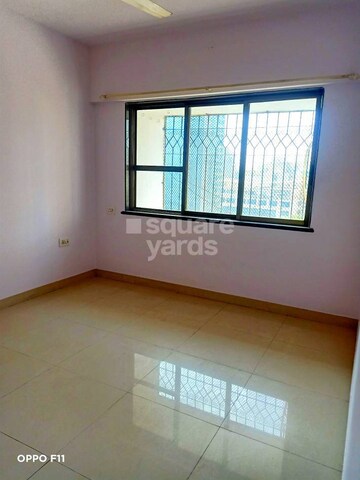 Bedroom in 2 BHK Apartment at Palash Towers, Andheri West – for Rent