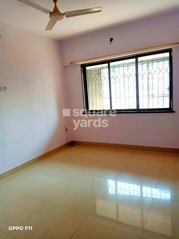Bedroom in 2 BHK Apartment at Palash Towers, Andheri West – for Sale