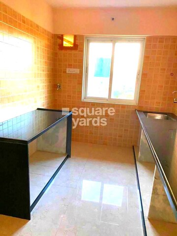 Kitchen in 2 BHK Apartment at Interintel Gurnani Palms, Amboli – for Rent
