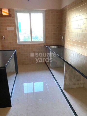 Kitchen in 2 BHK Apartment at Interintel Gurnani Palms, Amboli – for Sale
