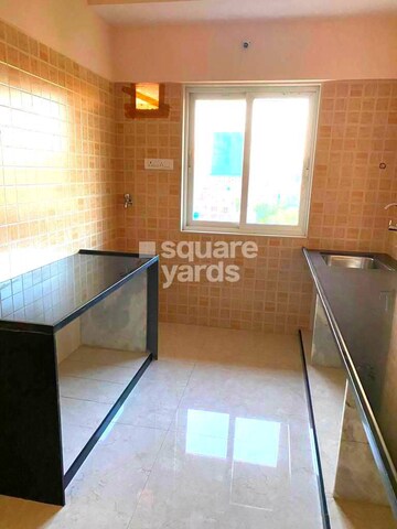 Kitchen in 3 BHK Apartment at Interintel Gurnani Palms, Amboli – for Sale