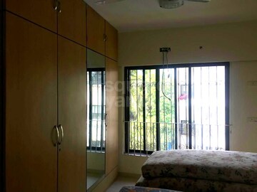 Room in 3 BHK Apartment at Juhu Vishal CHS, Juhu – for Rent
