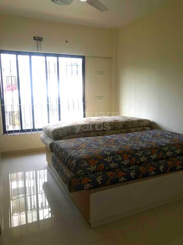 Bedroom in 3 BHK Apartment at Juhu Vishal CHS, Juhu – for Rent