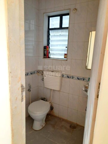 Bathroom in 1 BHK Apartment at Crimson Tower, Kandivali East – for Rent