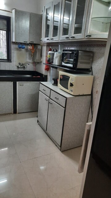 Kitchen in 3 BHK Apartment at Tarapore Gardens, Andheri West – for Sale