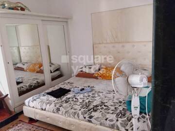 Bedroom in 2 BHK Apartment at Tarapore Gardens, Andheri West – for Rent