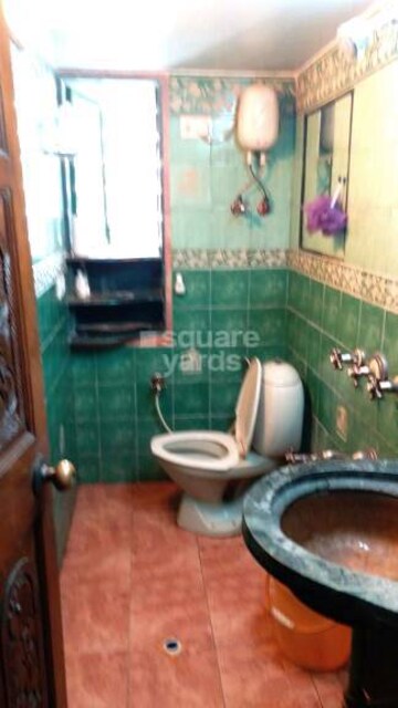 Bathroom in 2 BHK Apartment at Tarapore Gardens, Andheri West – for Rent