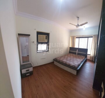 Bedroom in 2 BHK Apartment at K Raheja Raheja Classique, Andheri West – for Rent