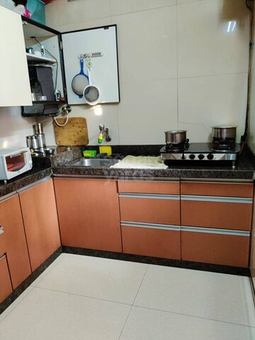 Kitchen in 2 BHK Apartment at Movie Tower, Andheri West – for Sale