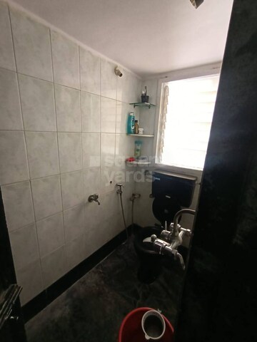 Bathroom in 2 BHK Apartment at Movie Tower, Andheri West – for Sale