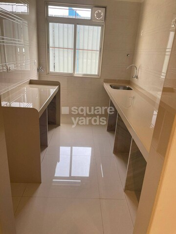 Kitchen in 1 BHK Builder Floor at Mahaavir Exotique, Kharghar – for Sale