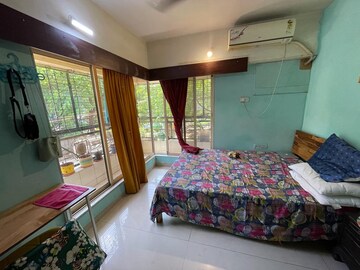 Bedroom in 2 BHK Apartment at Minaret Tower, Andheri West – for Sale