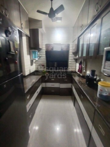 Kitchen in 2 BHK Apartment at Royal Classic Co Op Society, Andheri West – for Rent