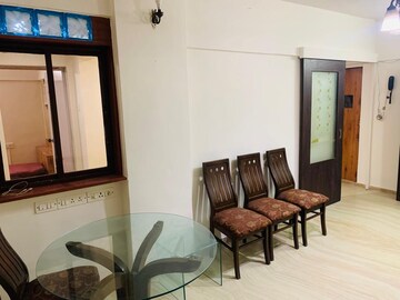 Living Room in 1 BHK Apartment at Lokhandwala Complex – for Sale