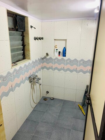 Bathroom in 1 BHK Apartment at Lokhandwala Complex – for Sale