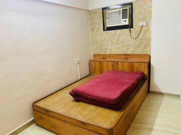 Bedroom in 1 BHK Apartment at Lokhandwala Complex – for Sale