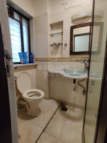 Bathroom in 2 BHK Apartment at Lokhandwala Complex – for Sale