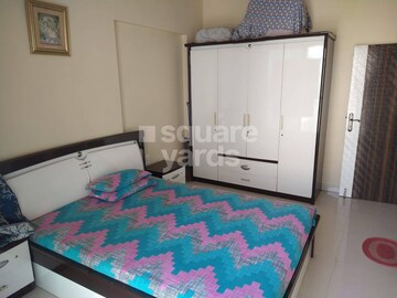 Bedroom in 2.5 BHK Apartment at Neo Vikram CHS, Andheri West – for Sale