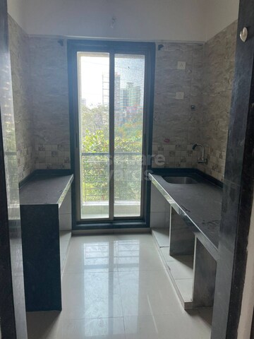 Kitchen in 1 BHK Apartment at Kamdhenu Aura, Taloja – for Sale