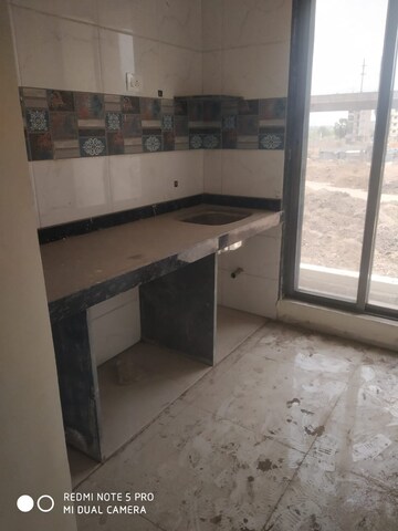 Kitchen in 1 BHK Apartment at Pramukh Narayan, Taloja – for Sale