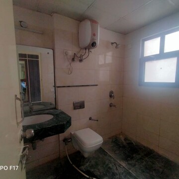 Bathroom in 3 BHK Apartment at Emaar Palm Heights, Sector 77 – for Rent