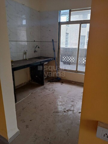 Kitchen in 2 BHK Apartment at Shiv Corner CHS, Taloja – for Sale