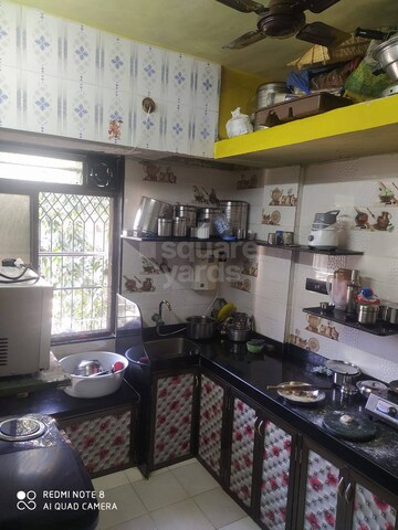 Kitchen in 1 BHK Penthouse at Nerul Sector 19 – for Sale