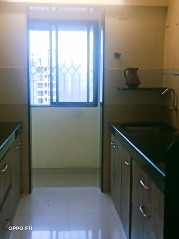 Kitchen in 2 BHK Apartment at Palash Towers, Andheri West – for Rent