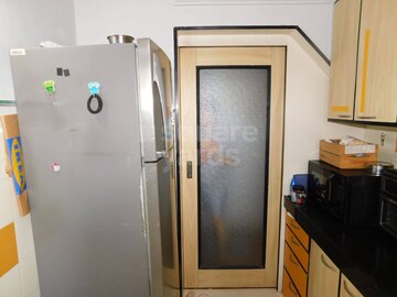 Bedroom in 2 BHK Apartment at Tarapore Towers, Andheri West – for Sale