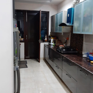 Kitchen in 3 BHK Builder Floor at Ansal API Esencia Wood Winds, Sector 67 – for Rent